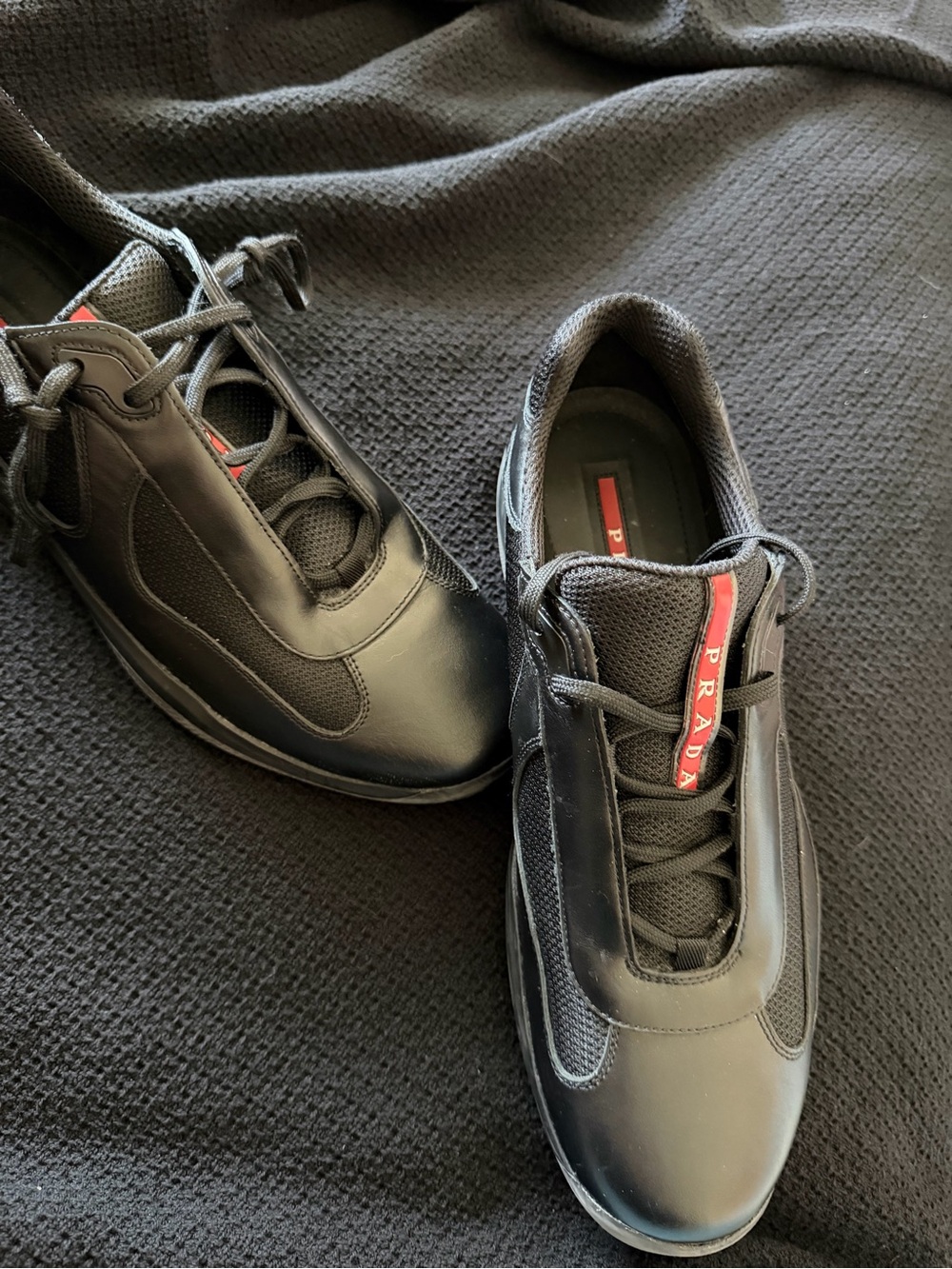 Prada Black Sneakers with Red Logo Tongue